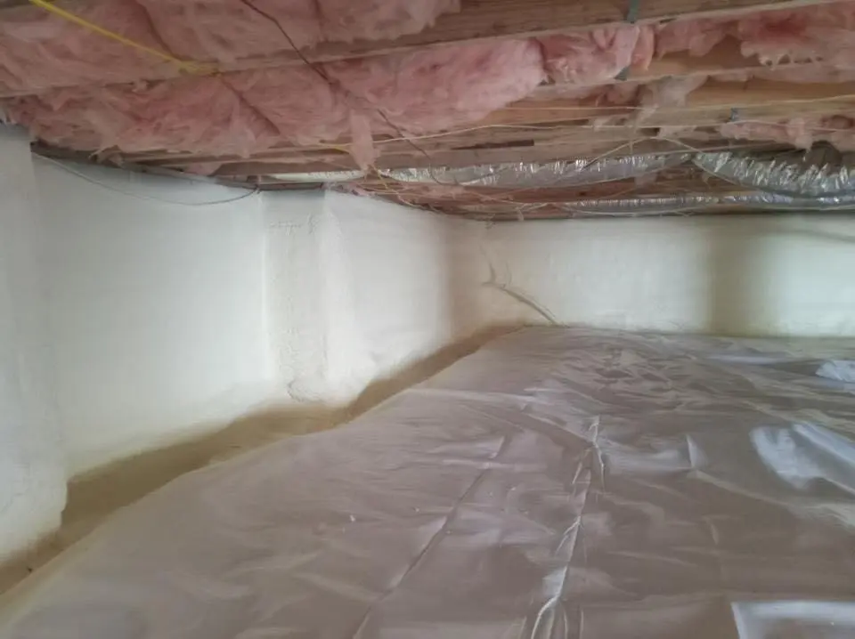 Crawl space encapsulation with closed-cell spray foam for Commercial Roof Restoration in Acworth